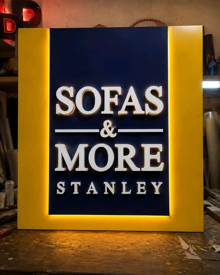 Backlit furniture showroom signboard with halo-lit border